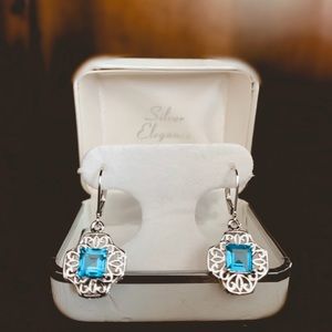 Sterling silver earring with authentic jem